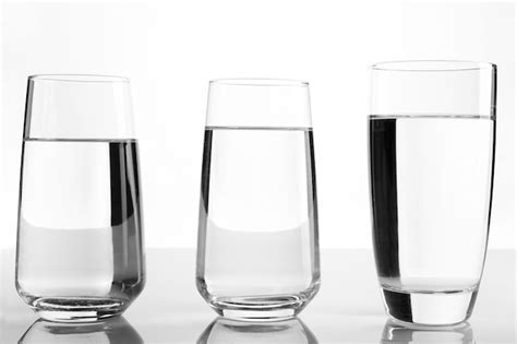 Premium Photo Glasses Of Water On Light Background