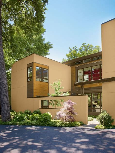 An Artists Rendering Of The Exterior Of A Modern House With Trees And