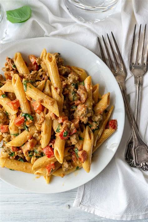 Creamy Italian Sausage And Tomato Pasta Foodtasia