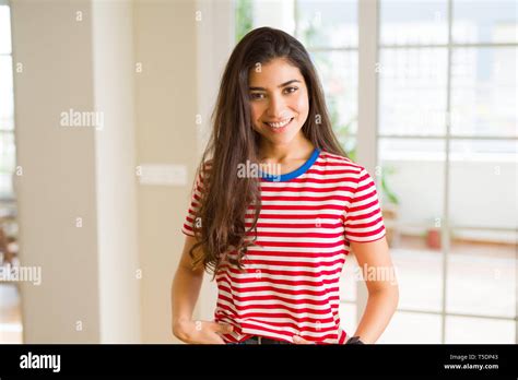 Beautiful Brunette Woman Smiling Cheerful Looking Happy And Positive Stock Photo Alamy