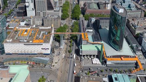 MVRDV Creates 600 Metre Long Orange Walkway That Bridges Rotterdam