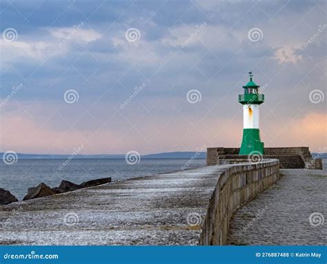 The Pier In The Town Harbor Of Sassnitz On The Island Of Rugen With The
