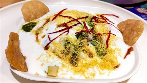 Famous Indian Dahi Vada Or Dahi Bhalla Chaat Served With Papdi And Sev