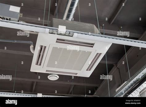 Ceiling mounted cassette type air conditioner Stock Photo - Alamy