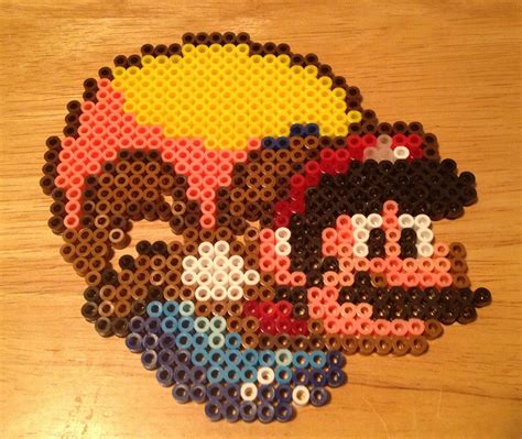 Cape Mario Perler Bead Sprite Super Mario World Snes Etsy Bead Sprite Perler Bead Mario