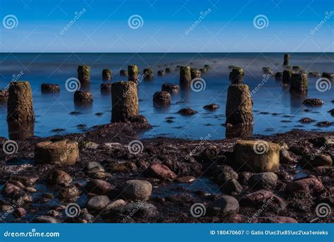 Old Boat Mooring Poles On The Shores Of The Baltic Sea Stock Image