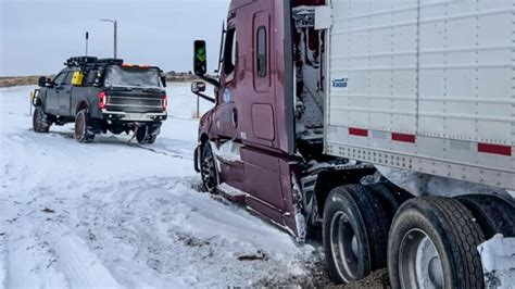 Watch: SEMA Ford F-350 Pickup Rescues Big Rig Stuck in Snow