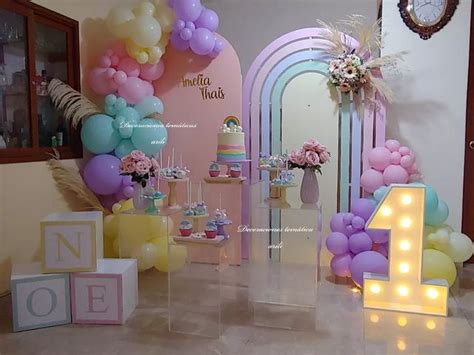 A Birthday Party With Balloons And Decorations