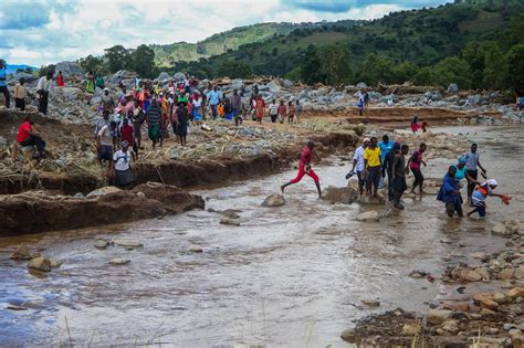 Cyclone Idai Laid Bare In Horrific Pictures As Mums Throw Babies Out Of