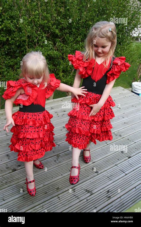 Little Girls Children Kids Dressed In Red And Black Polka Dot Spanish