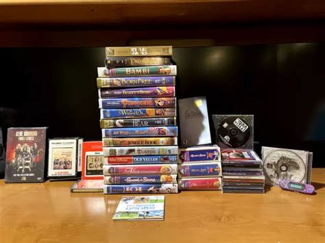 Lot 33 Walt Disney Vhs Movies Dvd Cd Tape Pixar Masterpiece Collection