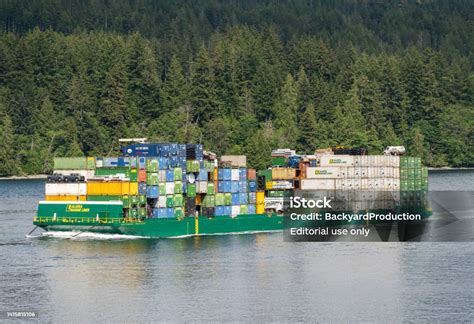 Alaska Marine Lines Barge Being Pulled Through Discovery Passage In Bc