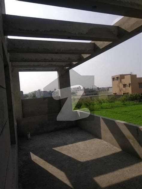 Grey Structure 12 Marla House For Sale In AWT Phase 2 Lahore AWT Phase