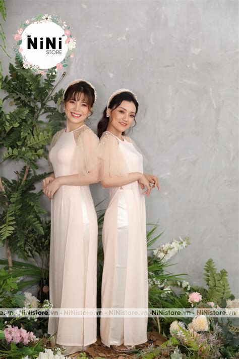 Áo dài bưng quả nữ hồng nude đính ngọc trai BNU52 NiNiStore 2025