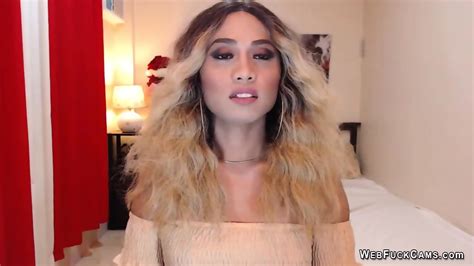 Blonde Shemale Wanks Off In Chair In Front Of Webcam