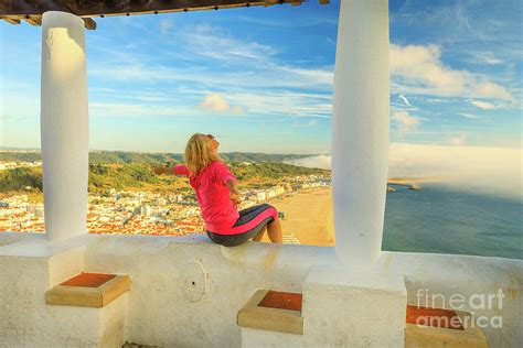 Nazare Viewpoint woman Photograph by Benny Marty - Fine Art America