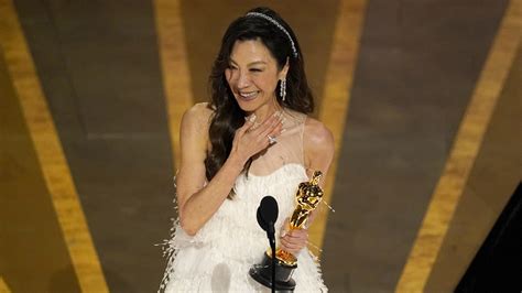 Oscar winner Michelle Yeoh, fiance Jean Todt walk down the aisle after ...