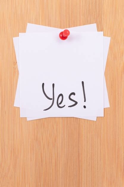 Premium Photo Yes White Sticky Notes With Written Word Yes Pinned To