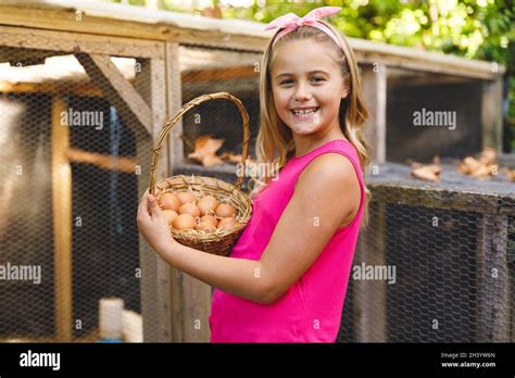 Girl Collecting Eggs Hi Res Stock Photography And Images Alamy