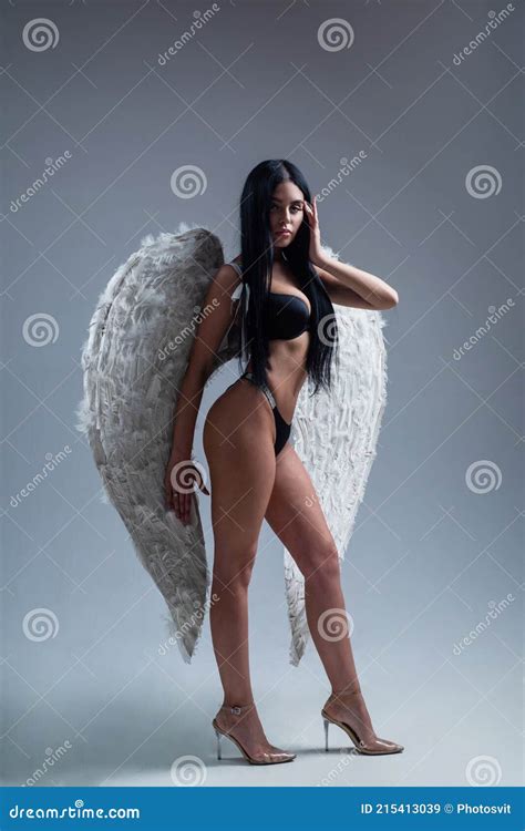 Woman With Perfect Body And Skin In Erotic Lingerie And Angel Wings Cupid Stock Image Image