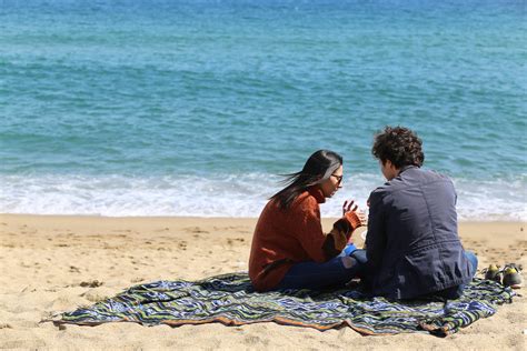 Two Person Walking on Beach · Free Stock Photo