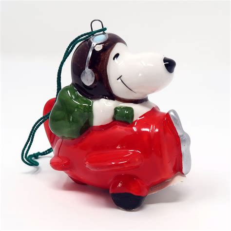 Snoopy In Plane Ceramic Christmas Ornament