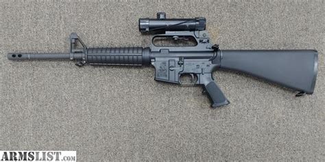 ARMSLIST - For Sale: Bushmaster XM15-E2S Colt 4x21 Scope