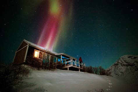 Northern Lights over a hut in the Kangerlussuaq backgrountry in ...