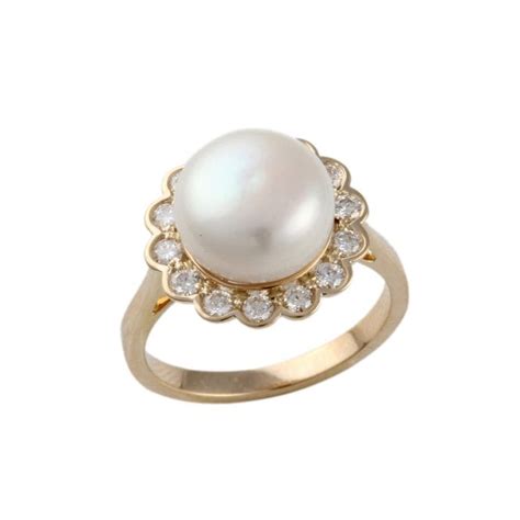 Yellow Gold 0 40ct Round Diamond And 5 58ct Pearl Set Cluster Ring