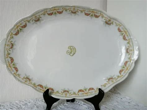 ANCIEN GRAND PLAT Ovale en Porcelaine de LIMOGES monogrammé D F