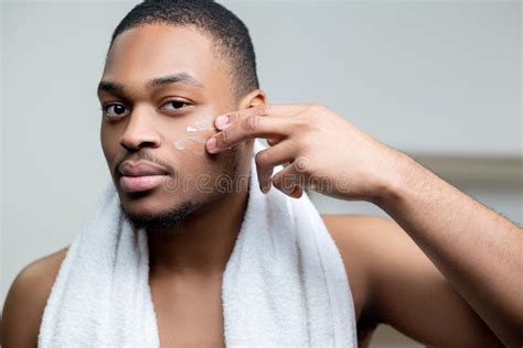 Male Skincare African Man Applying Face Cream Stock Image Image Of