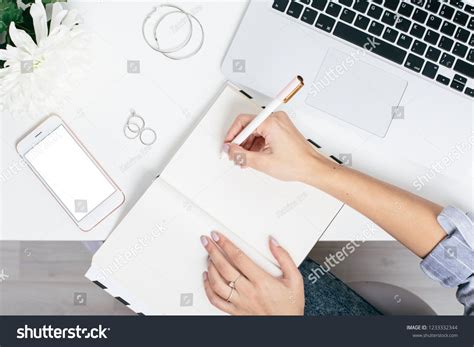 Female Hands Write Notebook On White Stock Photo 1233332344 Shutterstock