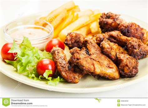 Chicken Wings With Fries French And Spicy Sauce Stock Photo Image Of