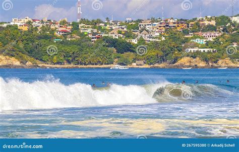 Surfer Surfing On Surfboard On High Waves In Puerto Escondido Mexico