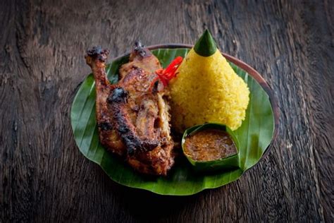 Indonesian Food Ayam Panggang And Nasi Kuning Grilled Chicken And Sticky