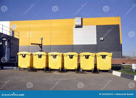 Yellow Trash Cans on Wheels for Waste Collection Stock Image - Image of municipal, pollution ...