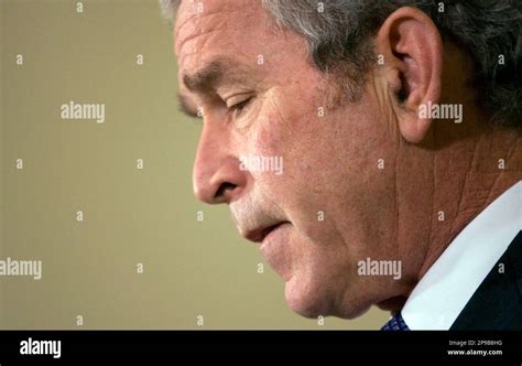 President George W Bush Pauses During A Statement On The Auto Industry