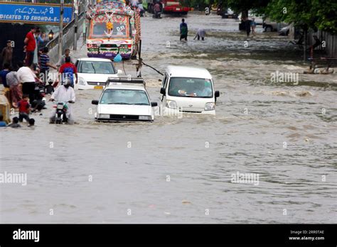 200826 KARACHI Aug 26 2020 Vehicles Travel Through Floodwater