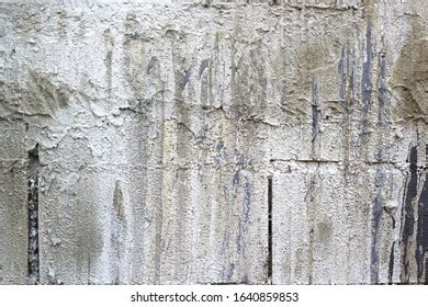 Dirty Old Eroded Cracked Plaster Cement Stock Photo