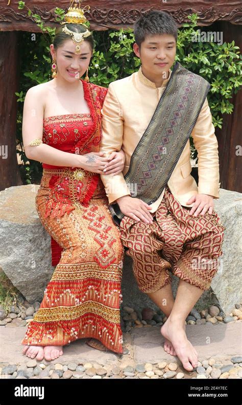 Phuketthailand April 7young Thai Couple In Traditional Outfit Sitting And Posing At Chalong