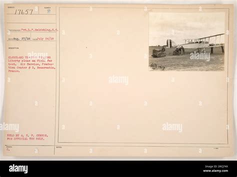 A Cleveland Tractor Pulling A Liberty Plane Onto A Field For Testing At