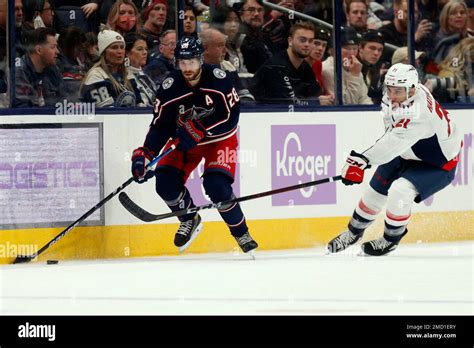 Columbus Blue Jackets Forward Oliver Bjorkstrand Left Controls The