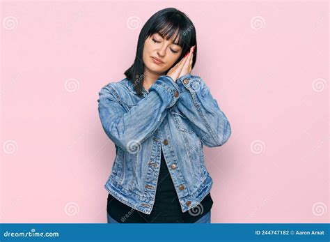 Young Hispanic Woman Wearing Casual Clothes Sleeping Tired Dreaming And