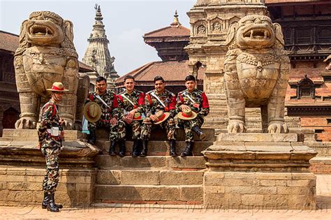 Stone Lions And Nepali Army Soldiers On Steps Bhaktapur Durbar Square