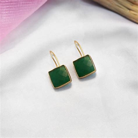 Niscka Gold Plated Emerald Green Danglers Earrings Buy Niscka Gold