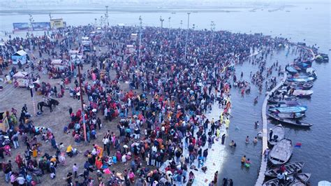 Magh Mela Begins Lakhs Brave Cold Take Dip In Sangam On Makar