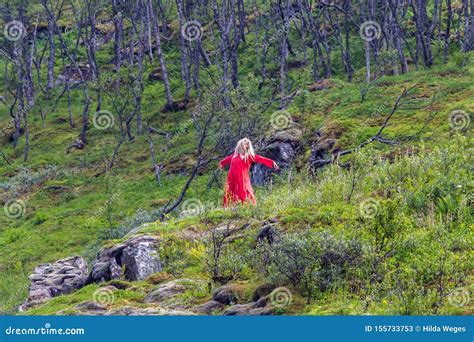 Huldra Dances In Front Of The Kjosfossen Waterfall In Norway Editorial