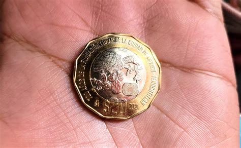 Entregan 820 mil al dueño de esta moneda de 20 pesos por esta razón