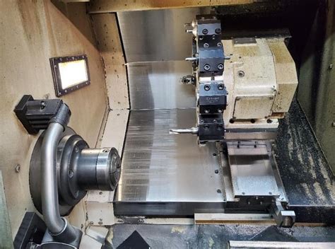 Used 2011 OKUMA Genos L400 E CNC Lathe For Sale At Machinery Revolution