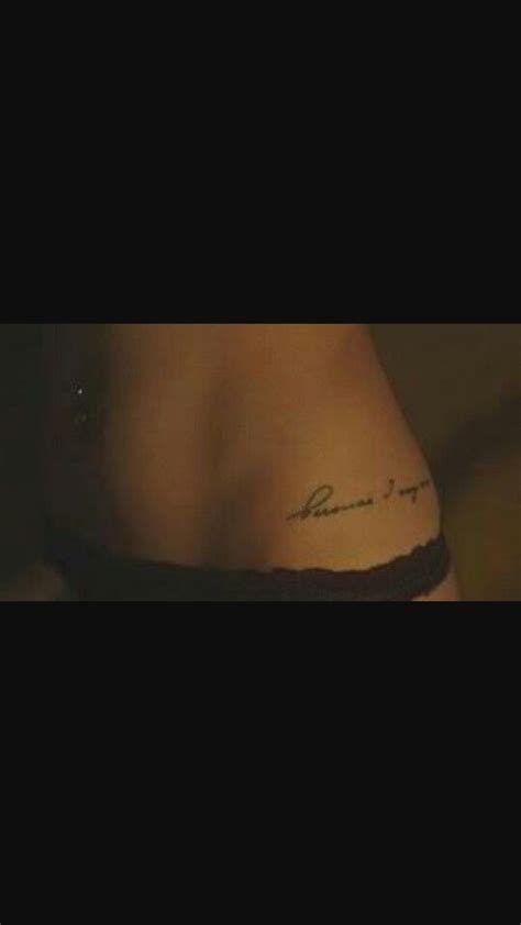 The Back Of A Woman S Stomach With Writing On It